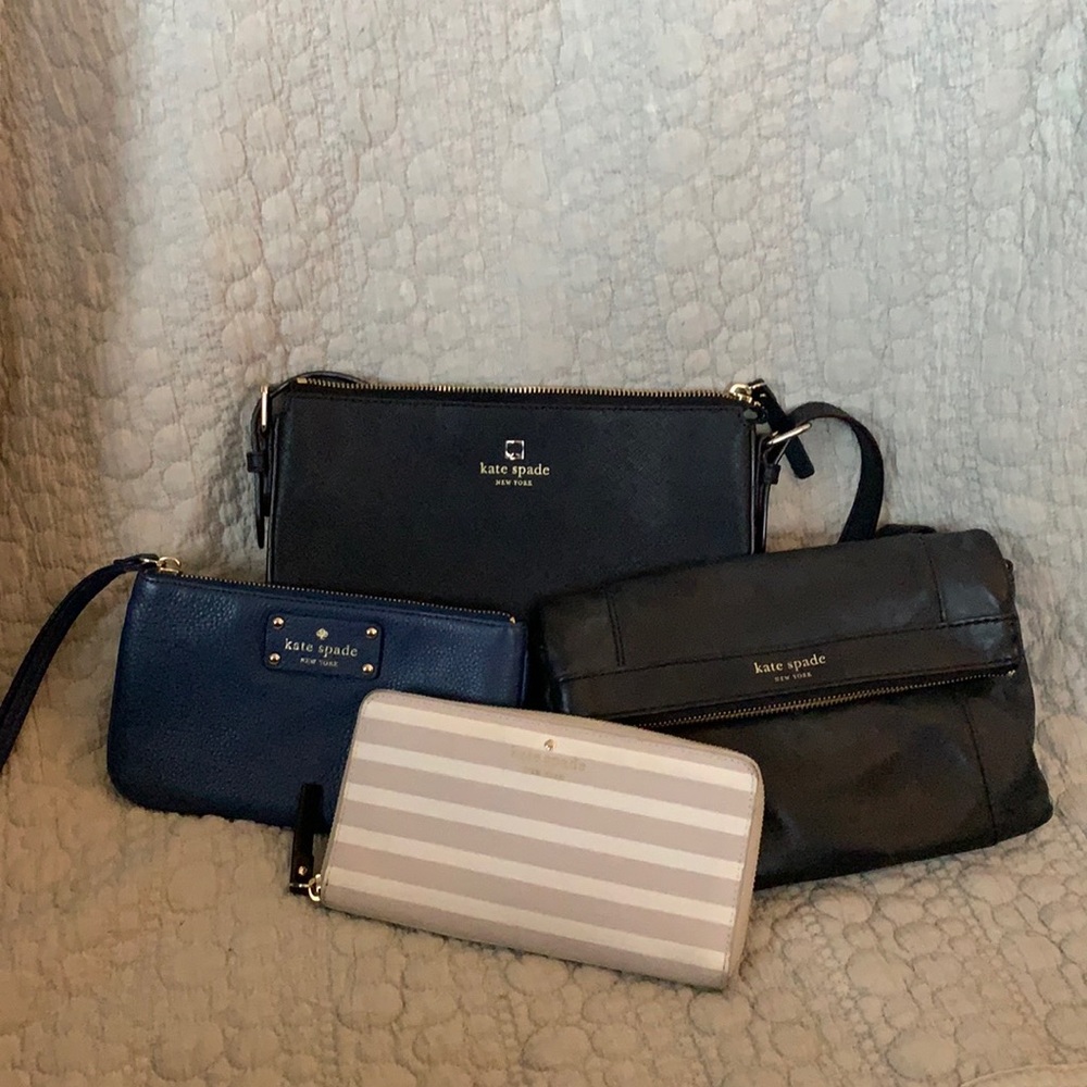 Small Kate Spade bags: ivory striped wallet, 2 black crossbody, & blue clutch